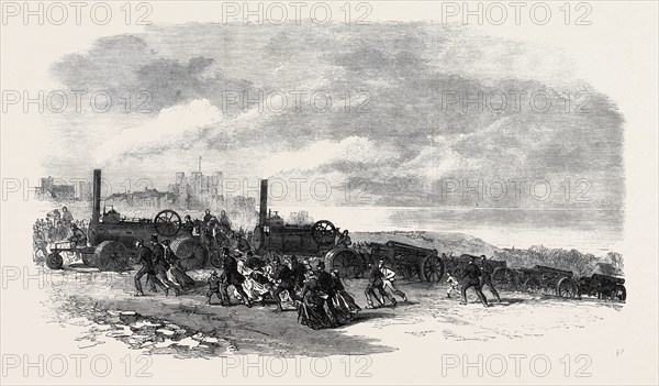 THE VOLUNTEER REVIEW AT DOVER: TRACTION ENGINES BRINGING VOLUNTEER ARTILLERY INTO POSITION, UK, 1869