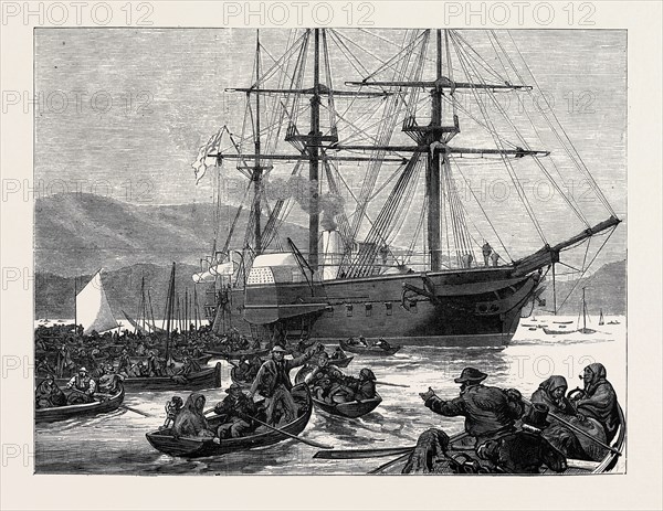 IRISH RELIEF SQUADRON, UNDER THE DUKE OF EDINBURGH: DISTRIBUTING STORES FROM H.M.S. VALOROUS AT KILKERRAN, 1880