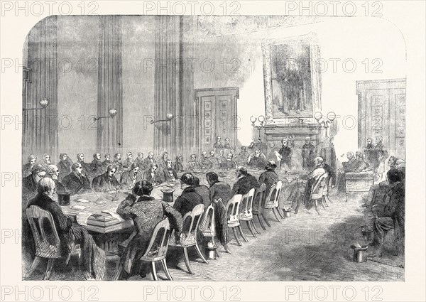 THE COTTON FAMINE: MEETING OF THE CENTRAL RELIEF COMMITTEE IN THE MAYOR'S PARLOUR AT THE MANCHESTER TOWNHALL, EARL OF DERBY IN THE CHAIR, 1862