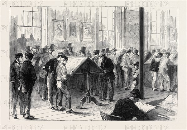 THE COTTON FAMINE: OPERATIVES READING THE LATEST NEWS FROM AMERICA, A SCENE IN CAMPFIELD FREE LIBRARY, MANCHESTER, 1862