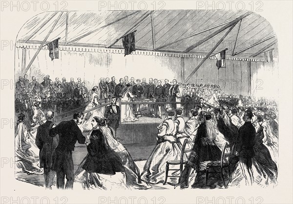 THE PRINCE OF WALES OPENING THE WAREHOUSEMEN AND CLERKS' NEW SCHOOLS: LADIES PLACING PURSES BEFORE THE PRINCE, 1866