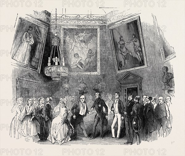 THE RECEPTION IN THE SALOON