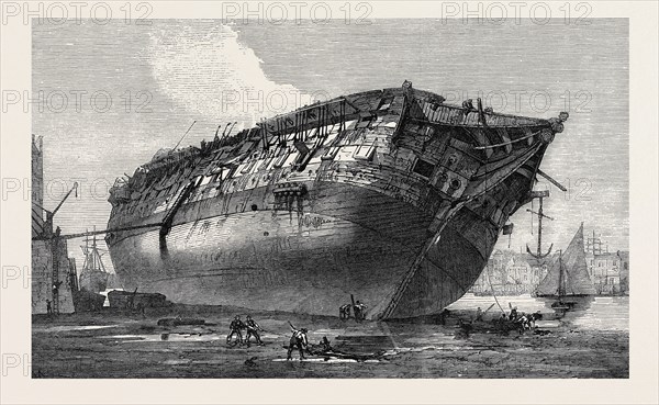 BREAKING-UP H.M.S. QUEEN AT ROTHERHITHE, 1871