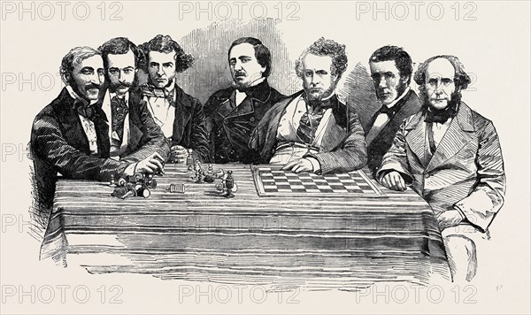 CHESS CELEBRITIES AT THE LATE CHESS MEETING, JULY 14, 1855; HERR LOWENTHAL, M. DE RIVIERE, MR. WYVILL, M.P., HERR FALKBEER, MR. STAUNTON, LORD LYTTELTON, CAPTAIN KENNEDY