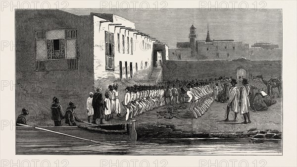 THE REBELLION IN THE SOUDAN (SUDAN), EGYPTIAN SOLDIERS PERFORMING A RELIGIOUS DANCE IN THE CUSTOM HOUSE YARD, SUAKIM, IN HONOUR OF THE VISIT OF SOME NATIVE SHEIKS, JANUARY 4TH