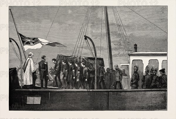 THE LATE DUKE OF ALBANY, THE ARRIVAL AT PORTSMOUTH, APRIL 4, 1884: BRINGING THE COFFIN ASHORE FROM THE "OSBORNE" IN PORTSMOUTH DOCKYARD