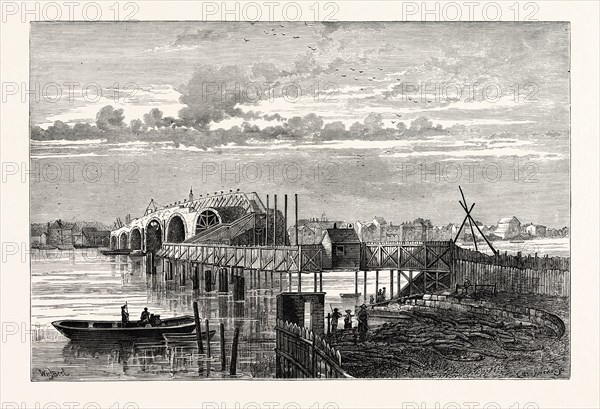 BLACKFRIARS OLD BRIDGE DURING ITS CONSTRUCTION, SHOWING THE TEMPORARY FOOT BRIDGE. From a Print of 1775, LONDON