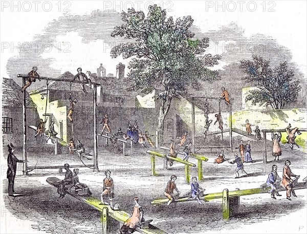 Gymnasia and play ground of the children of the infant school, gymnastic; athletics; gym class; seesaw; own; garden; tree; teacher; schoolteacher; excitment; sport; gathering; class; schoolclass; climbing; activity; skill; balance; playing; 19th century