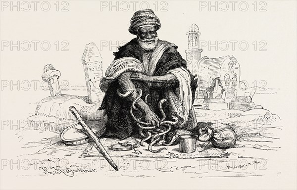 SNAKE-CHARMER.  Snake charming is the practice of pretending to hypnotise a snake by playing an instrument. Egypt, engraving 1879