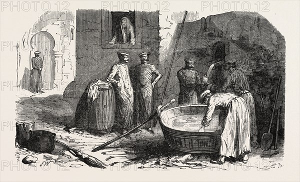 Russian soldiers preparing their meals. 1855. Engraving