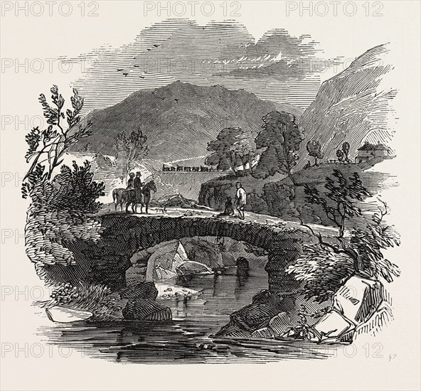 OPENING OF THE LANCASTER AND CARLISLE RAILWAY: PACKHORSE BRIDGE OVER THE LUNE. BORROW BRIDGE, THE RAILWAY IN THE DISTANCE. UK, 1846