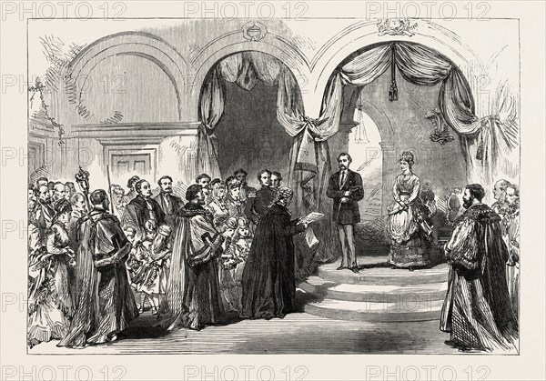RECEPTION OF THE PRINCE AND PRINCESS OF WALES AT THE RAILWAY STATION, HULL: THE TOWN CLERK READING THE ADDRESS, 1869