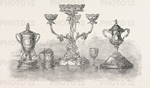 FIRST SURREY RIFLES PRIZES: THE LADIES' CHALLENGE CUP. LIEUT. PUCKLE'S PRIZE. MISS ELLIOTSON'S PRIZE. LIEUT. GUDGEON'S PRIZE. CHALLENGE CUP PRESENTED BY LIEUT.-COL. MACDONALD. 1861