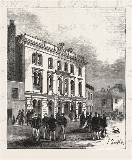 THE FOX AND HOUNDS, PUTNEY, OXFORD HEAD-QUARTERS, The Boat Race is an annual rowing race between the Oxford University Boat Club and the Cambridge University Boat Club, rowed between competing eights on the River Thames in London, England, ENGRAVING 1876, UK, britain, british, europe, united kingdom, great britain, european