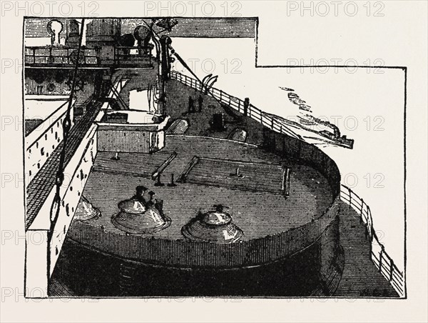 THE NEW WAR SHIP OF THE BRITISH NAVY, H.M.S. INFLEXIBLE: LOOKING OVER THE TURRET FROM THE FORE BRIDGE: SIGHTING THE GUNS FROM THE MANHOLES IN THE TURRET, 1882