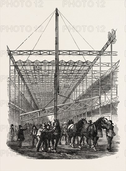 RAISING THE GIRDERS OF THE CENTRAL AISLE OF THE CRYSTAL PALACE, THE GREAT EXHIBITION, LONDON, UK, 1851 engraving