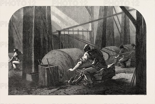 THE MANUFACTURE OF GUN BARRELS, AT BIRMINGHAM, UK: GRINDING THE GUN BARRELS, 1851 engraving