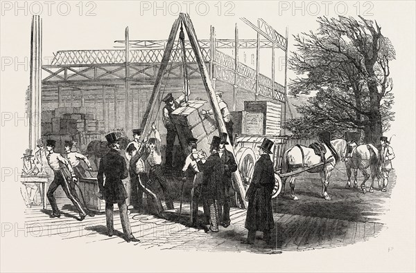 RECEPTION OF GOODS IN THE GREAT EXHIBITION BUILDING, THE CRYSTAL PALACE, HYDE PARK, LONDON, UK, 1851 engraving