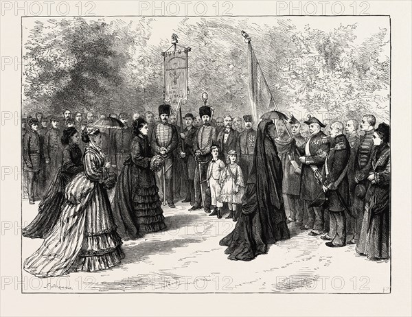 THE FETE NAPOLEON AT CHISLEHURST: RECEPTION OF THE VISITORS BY THE EX-EMPRESS EUGENIE IN THE GARDEN OF CAMDEN PLACE, UK, 1873 engraving