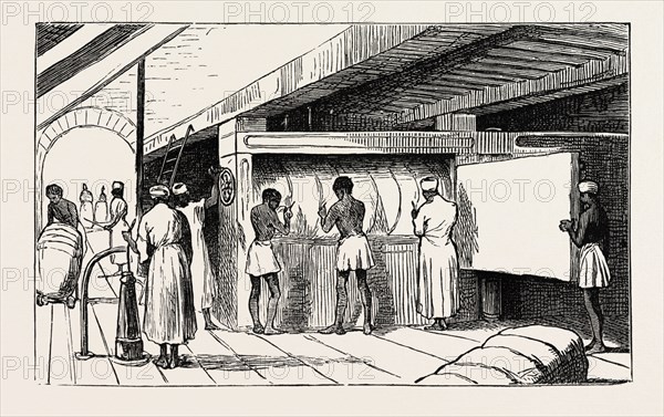 INTERIOR OF SHUNA: THE HYDRAULIC PRESS, BANDING THE BALES, EGYPT, 1873 engraving