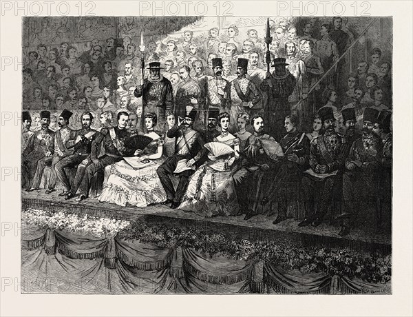 THE STATE CONCERT AT THE ROYAL ALBERT HALL: THE DAIS, LONDON, UK. DUKE OF EDINBURGH, THE CESAREWITCH, PRINCESS OF WALES, THE SHAH, THE CESAREVNA, PRINCE OF WALES, PRINCE ARTHUR, LONDON, UK, 1873 engraving