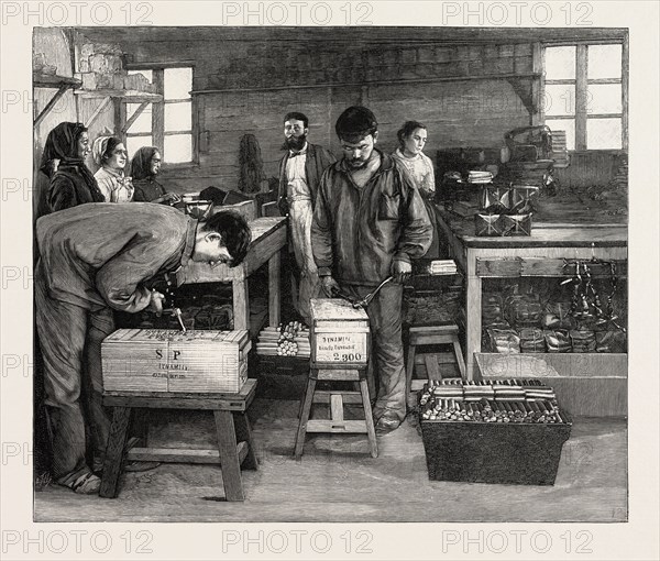 DYNAMITE MANUFACTURE AT ISLETEN, NEAR FLUELEN, SWITZERLAND: PACKING THE CARTRIDGES INTO BOXES