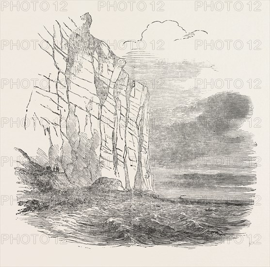 LANDING THE SUBMARINE TELEGRAPH ON THE FRENCH COAST. CAVE THROUGH WHICH THE WIRE IS CARRIED, UP A SHAFT IN THE ROCK, 1851