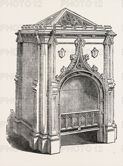 HALL STOVE, BY PIERCE, JERMYN STREET, LONDON, UK. THIS IS A PRO-PNEUMATIC WARMING AND VENTILATING STOVE GRATE, SUITABLE FOR THE ENTRANCE HALL OR STAIRCASE. THE OUTER COATING IS OF CAST IRON AND THE INTERIOR IS OF PREPARED FIRE-CLAY
