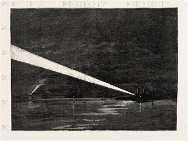 THE NAVAL MANOEUVRES, WITH THE HOSTILE FLEET: THE FLEET SIGNALLING WITH THE ELECTRIC SEARCH LIGHT TO THE COLLIERS AND CRUISERS AT A DISTANCE OF FORTY MILES, 1890 engraving