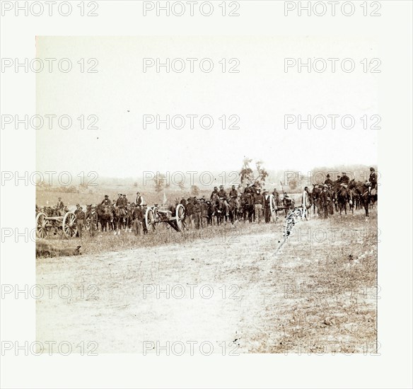 American Civil War: Captain J. M. Knap's Pennsylvania Independent Battery E Light Artillery approaching the battlefield at Antietam, Maryland after the battle in September 1862. A dead horse lay in the foreground. Photo, albumen print, By Alexander Gardner, 1821 1882, Scottish photographer who emigrated to the United States in 1856. From Gardner Photographic Art Gallery, Seventh Street, Washington