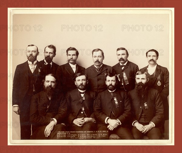 Past Grand Masters of Dakota I.O.O. F., 1890, at Deadwood, S.D. A.E. Clough, A.E.Nugent, H.J. Rowe, Wm. A. Bently, F.W. Miller, F.S. Emeison. A.G. Smith, R.R. Briggs, Zina Richey, H.J. Rice, John C. H. Grabill was an american photographer. In 1886 he opened his first photographic studio