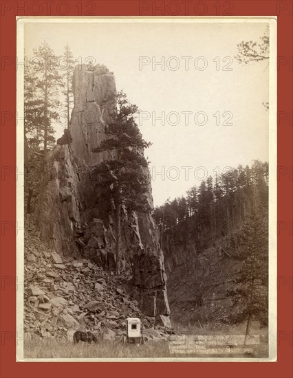 Castle Rock. Scenery on road between Hill City and Rockerville, Dak., John C. H. Grabill was an american photographer. In 1886 he opened his first photographic studio