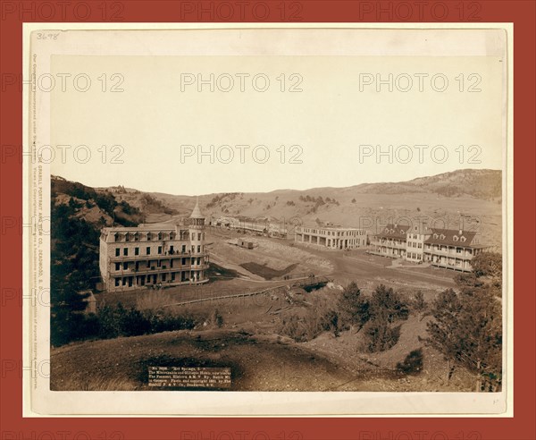 Hot Springs, S.D. The Minnekahta and Gillispie Hotels, new blocks. The Fremont, Elkhorn & M.V. Ry., Battle Mt. in distance, John C. H. Grabill was an american photographer. In 1886 he opened his first photographic studio
