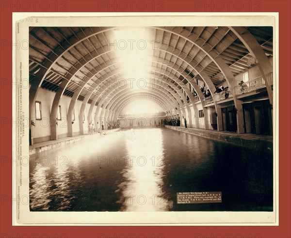 Hot Springs, S.D. Interior of largest plunge bath in U.S. on F.E. and M.V. R'y, John C. H. Grabill was an american photographer. In 1886 he opened his first photographic studio