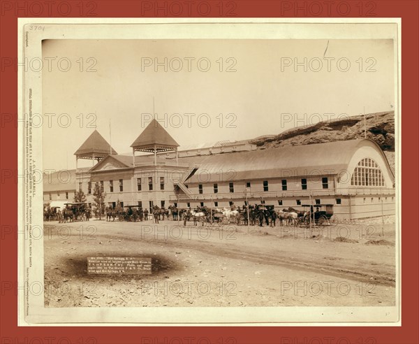 Hot Springs, S.D. Exterior view of largest plunge bath house in U.S. on F.E. and M.V. R'y, John C. H. Grabill was an american photographer. In 1886 he opened his first photographic studio