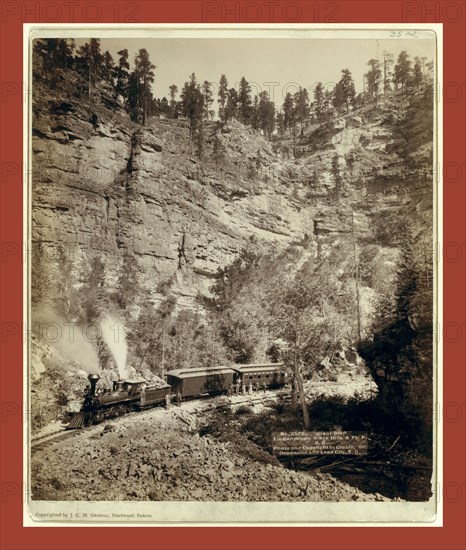 Giant Bluff. Elk Canyon on Black Hills and Ft. P. R.R., John C. H. Grabill was an american photographer. In 1886 he opened his first photographic studio