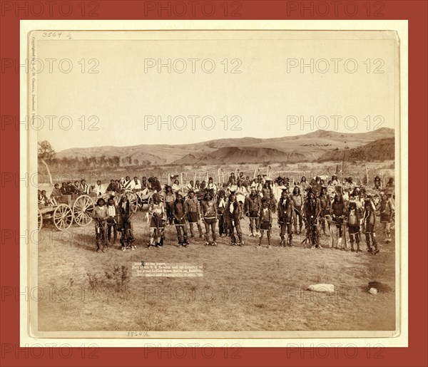 At the dance. Part of the 8th U.S. Cavalry and 3rd Infantry at the great Indian grass dance on reservation, John C. H. Grabill was an american photographer. In 1886 he opened his first photographic studio
