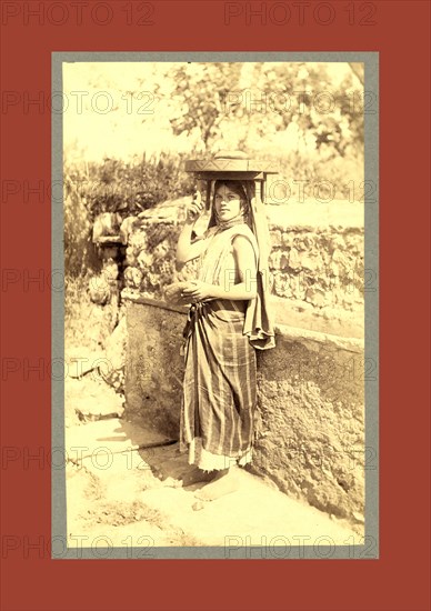 Types Algerians Young girl bread market, Neurdein brothers 1860 1890, the Neurdein photographs of Algeria including Byzantine and Roman ruins in Tébessa and Thamugadi; mosques, shrines, public buildings, palaces, and street scenes in Mostaganem, Biskra, Algiers, Tlemcen, Constantine, Oran, and Sidi Bel AbbÃ¨s; and the cathedral at Carthage. Portraits of Algerian people include Berbers, Ouled NaÃ¯l women, and prisoners in Annaba. Tunisian views include mosques, buildings, and street scenes in Tunis.