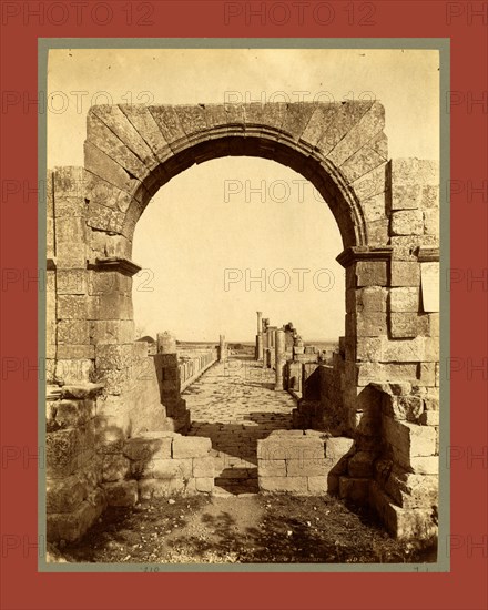 Tebessa Byzantine Basilica, exterior door, Algiers, Neurdein brothers 1860 1890, the Neurdein photographs of Algeria including Byzantine and Roman ruins in Tébessa and Thamugadi; mosques, shrines, public buildings, palaces, and street scenes in Mostaganem, Biskra, Algiers, Tlemcen, Constantine, Oran, and Sidi Bel AbbÃ¨s; and the cathedral at Carthage. Portraits of Algerian people include Berbers, Ouled NaÃ¯l women, and prisoners in Annaba. Tunisian views include mosques, buildings, and street scenes in Tunis.