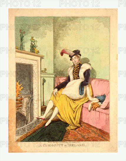 A Curiosity in Ireland, Lady seated by the fire., London, 1814, a woman sitting on settee by fireplace. She wears a small hat trimmed with a feather, a short braided hussar jacket, a limp skirt draping her knees, with a long boa and large muff of white fur.