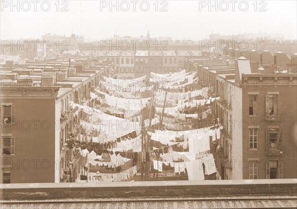 Yard of a tenement at Park Ave. Avenue and 107th St, New York, Laundry, Tenement houses, United States, New York (State), New York, 1900