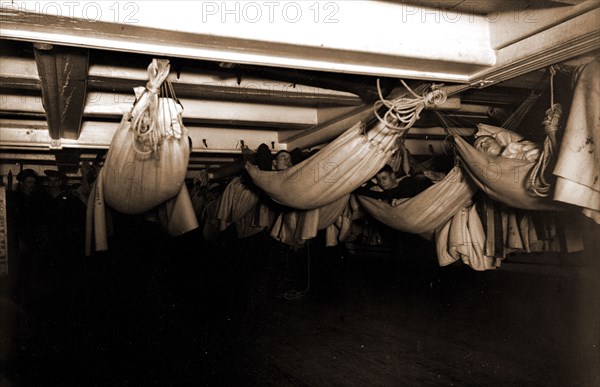 U.S.S. New Hampshire, watch below, New Hampshire (Training ship), Government vessels, American, Hammocks (Furniture), Seamen, American, Crew quarters, Sleeping, 1900