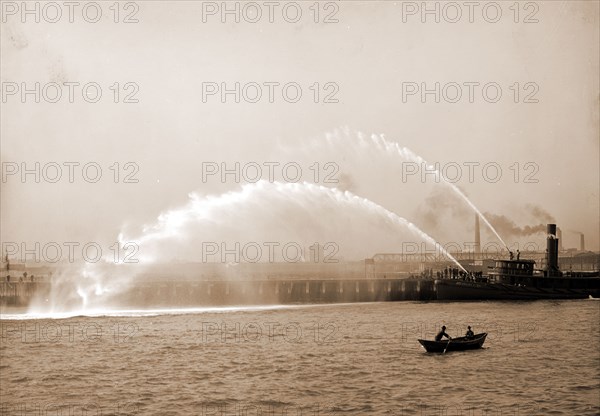 Fireboat 44 in action, Boston, Mass, Fireboats, Waterfronts, Rowboats, United States, Massachusetts, Boston, 1906