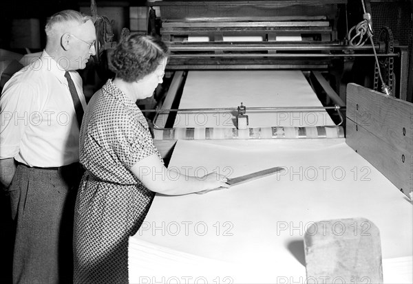 Mt. Holyoke, Massachusetts - Paper. American Writing Paper Co. Finley Cutter, 1936, Lewis Hine, 1874 - 1940, was an American photographer, who used his camera as a tool for social reform. US,USA