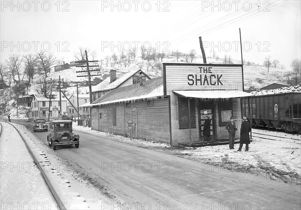 Scott's Run, West Virginia. The Shack Community Center - Scene is typical of crowded space. In center of valley the stream is Scott's Run Crack. The Shack is a community center sponsored by a religious organization, 1936, Lewis Hine, 1874 - 1940, was an American photographer, who used his camera as a tool for social reform. US,USA