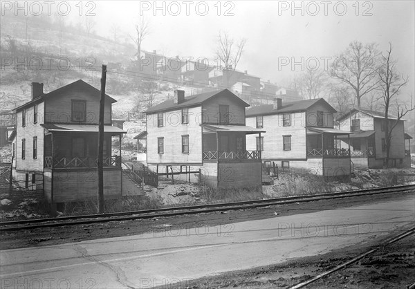 Scott's Run, West Virginia. Pursglove Mines Nos. 4 and 5 - Scene taken from main highway shows typical hillside settlements. Houses shown are for supervisory staff. Camp one of the best on Scott's Run, March 1937, Lewis Hine, 1874 - 1940, was an American photographer, who used his camera as a tool for social reform. US,USA