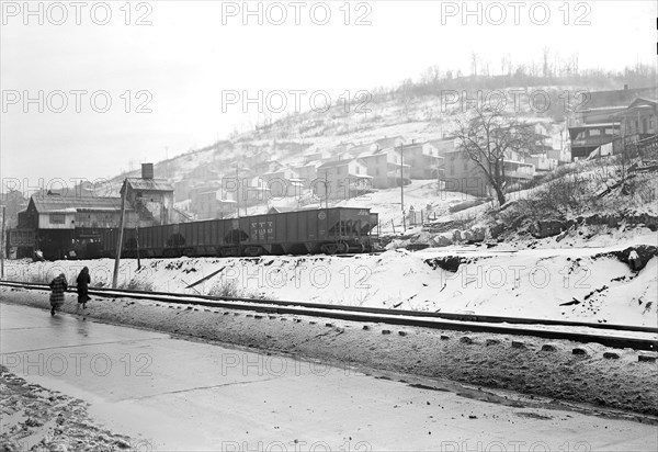 Scott's Run, West Virginia. Pursglove No. 5 - Scene taken from main highway shows typical hillside camp. The houses are multiple dwellings, March 1937, Lewis Hine, 1874 - 1940, was an American photographer, who used his camera as a tool for social reform. US,USA