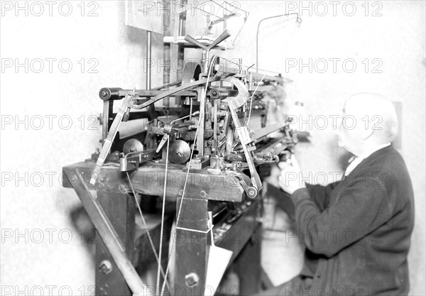 Philadelphia, Pennsylvania - Hosiery. Minnesac Mills. [Man working at machine.], May 1937, Lewis Hine, 1874 - 1940, was an American photographer, who used his camera as a tool for social reform. US,USA