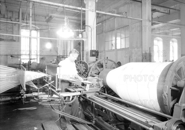 Paterson, New Jersey - Textiles - Jackson Winding and Warping Company - Picture of a high speed warper, June 1937, Lewis Hine, 1874 - 1940, was an American photographer, who used his camera as a tool for social reform. US,USA