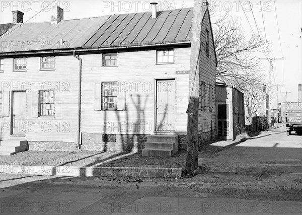 Lancaster, Pennsylvania - Housing. Low-priced houses on Cabbage Hill - rental about $12.00 per month - (umbrella factory in distance), 1936, Lewis Hine, 1874 - 1940, was an American photographer, who used his camera as a tool for social reform. US,USA